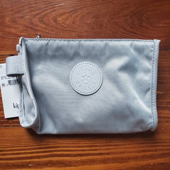 Kipling Bags New Kipling Large Multipurpose Silver Pou Poshmark